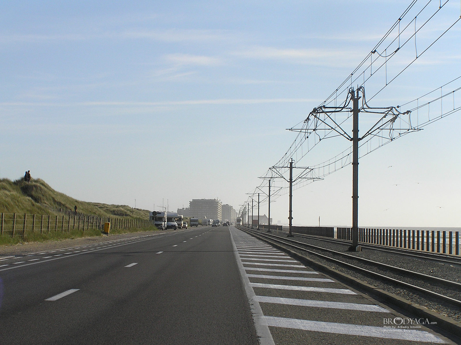 Coastal tram line in Mariakerke, with the casino of Middelkerke at the back